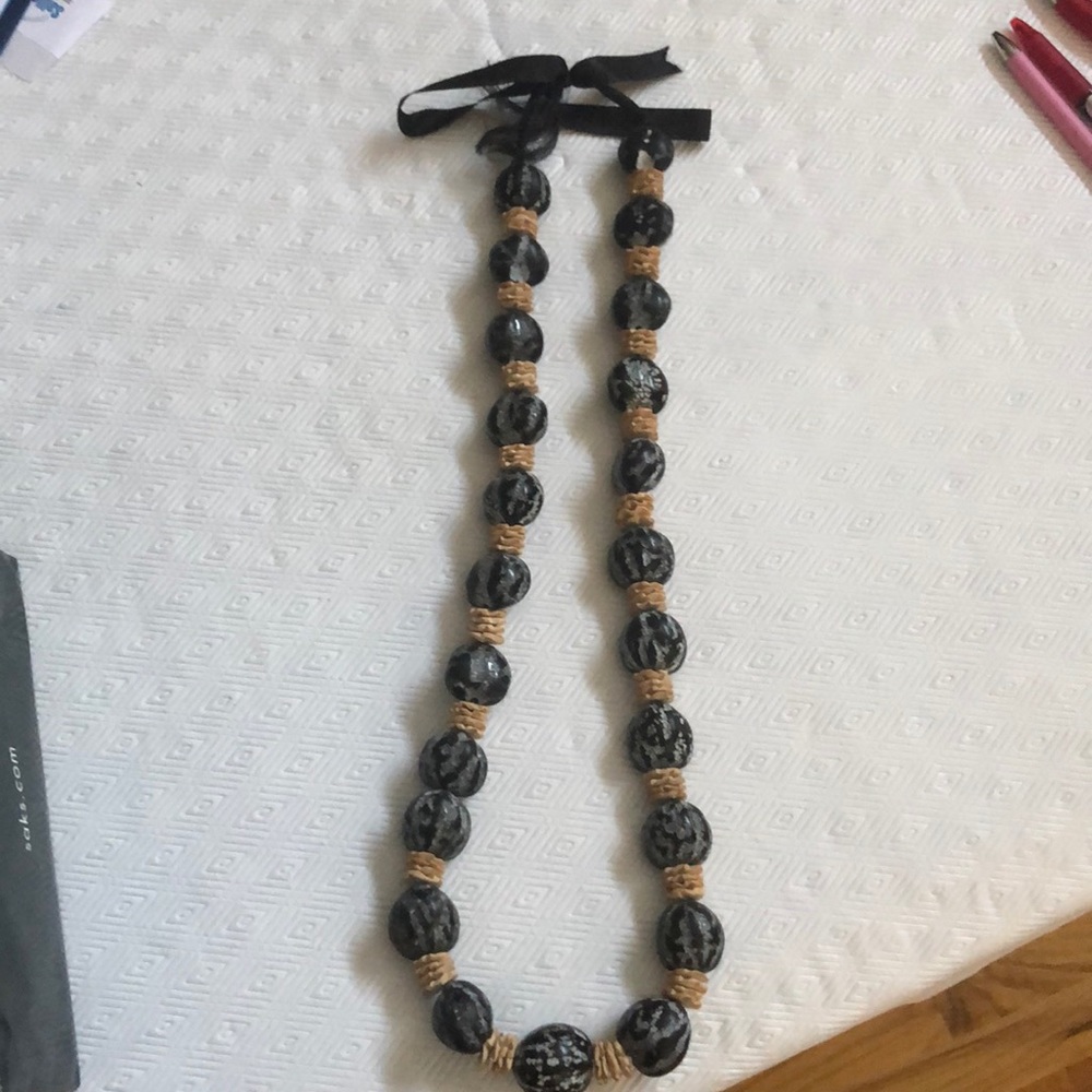 Textured, bold bead with ribbon tie